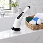 ShineSpin handheld spin scrubber on a bathtub edge with a basket of brush heads