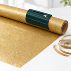 Green SnapCut on gold glitter paper with a clean cut edge