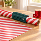 Green SnapCut on a roll of striped wrapping paper with a straight cut