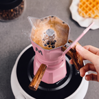 Coffee with crema brewing in the pink ThermaCrema